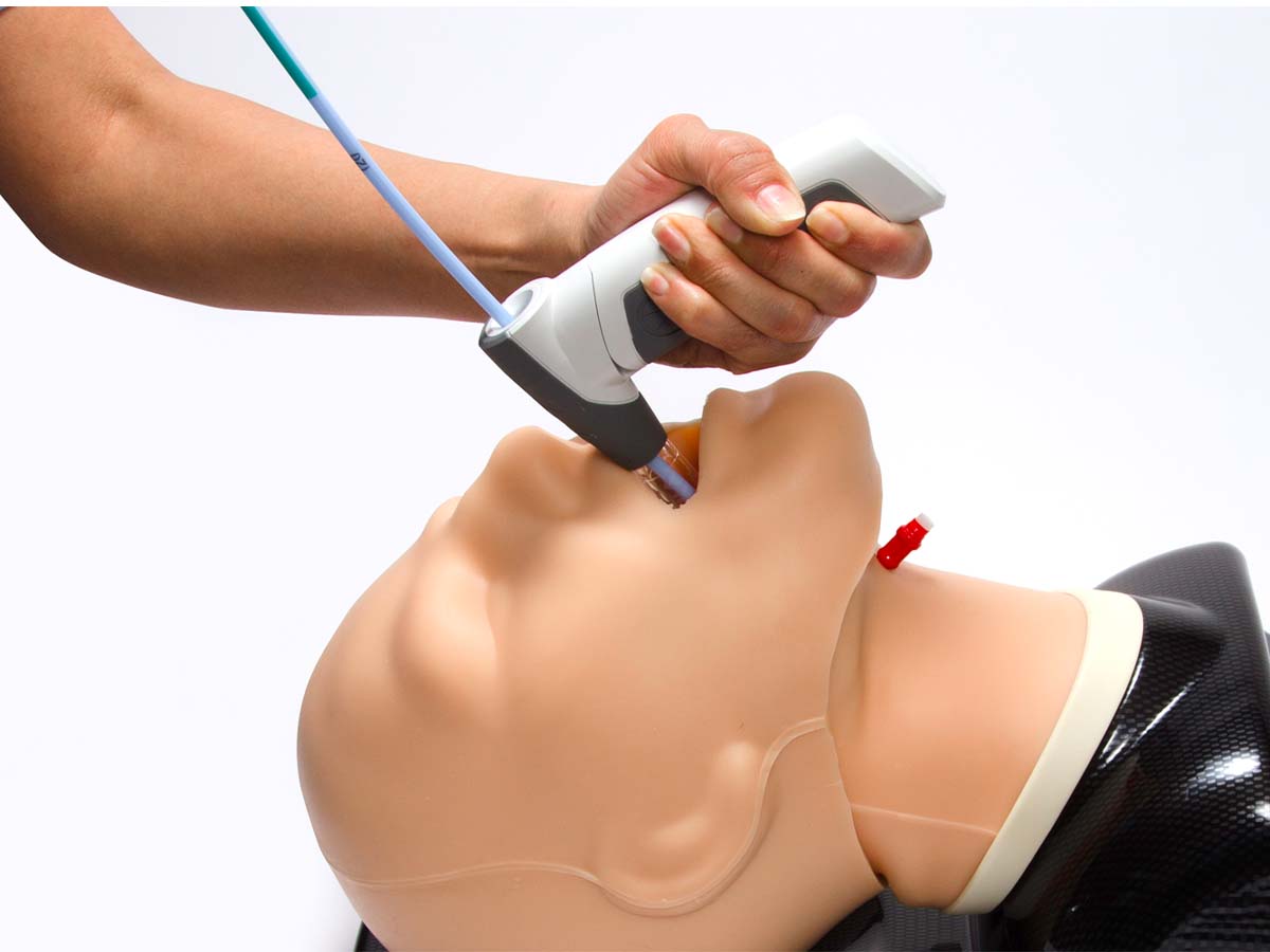 medical professional demonstrating Vie Scope® for intubation