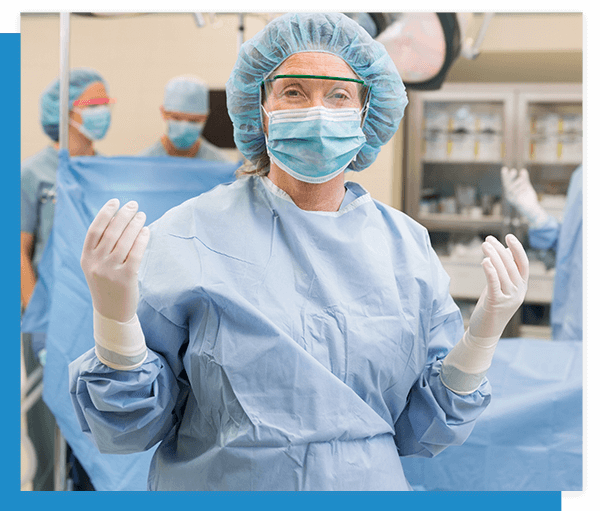 Image of a female doctor and her team in an operating room